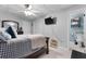 Bedroom leading to a bathroom with toilet and shelves at 405 Miller Rd, Covington, GA 30014