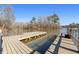 A wooden dock with seating over the water at 405 Miller Rd, Covington, GA 30014