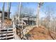 Exterior of home with a multi-level deck, steps, and views of the lake at 405 Miller Rd, Covington, GA 30014