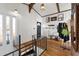 Bright foyer with wooden floors, white walls, and stairs with iron railing at 405 Miller Rd, Covington, GA 30014