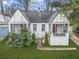Charming two-story home with white brick and screened porch at 960 Byron Sw Dr, Atlanta, GA 30310