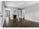 Living room with hardwood floors, fireplace, fresh paint, and natural light at 960 Byron Sw Dr, Atlanta, GA 30310