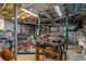 Basement with exposed duct work, piping, and a variety of workshop equipment at 1145 Arbordale Dr, Decatur, GA 30033