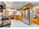 Well-equipped kitchen with stainless steel appliances, granite countertops, and seamless access to the dining area at 1145 Arbordale Dr, Decatur, GA 30033