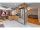 Eat-in kitchen featuring stainless steel appliances, tile floors, and ample counter space at 1145 Arbordale Dr, Decatur, GA 30033
