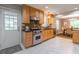 A gourmet kitchen that boasts custom cabinets, granite countertops, and stainless steel appliances at 1145 Arbordale Dr, Decatur, GA 30033