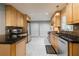 Modern kitchen with stainless steel appliances, granite countertops, and ample cabinet space at 1145 Arbordale Dr, Decatur, GA 30033