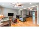 Spacious living room featuring hardwood floors, ceiling fans, and neutral paint at 1145 Arbordale Dr, Decatur, GA 30033
