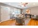 Bright living room with hardwood floors, neutral decor, and a large window providing ample natural light at 1145 Arbordale Dr, Decatur, GA 30033