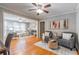Cozy living room with hardwood floors, neutral paint, and an abundance of natural light at 1145 Arbordale Dr, Decatur, GA 30033