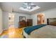 Bright main bedroom featuring a skylight, hardwood floors, and ensuite bathroom at 1145 Arbordale Dr, Decatur, GA 30033