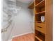 Walk-in closet includes shelving and hanging options for storing clothes at 1145 Arbordale Dr, Decatur, GA 30033