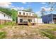 Two-story deck overlooking a spacious backyard, perfect for outdoor entertaining and enjoying nature at 223 Altoona Sw Pl, Atlanta, GA 30314