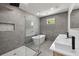 Sleek bathroom featuring a glass shower, soaking tub, and double vanity with modern fixtures at 223 Altoona Sw Pl, Atlanta, GA 30314