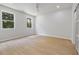Bright bedroom features two windows and ample space at 223 Altoona Sw Pl, Atlanta, GA 30314