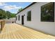 Spacious wood deck offering beautiful outdoor space and views of the surrounding landscape at 223 Altoona Sw Pl, Atlanta, GA 30314