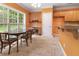 Kitchen with breakfast nook featuring a window and a table with chairs for a casual dining area at 240 Huiet Dr, Mcdonough, GA 30252