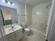 Well-maintained bathroom with a shower-tub combo, vanity, and essential fixtures at 2887 Royal Blf, Decatur, GA 30030