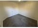 Cozy bedroom with neutral walls, carpet floors, closet, and a white door at 2887 Royal Blf, Decatur, GA 30030
