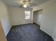 Bedroom featuring a neutral color palette and carpet flooring with a window and closet at 2887 Royal Blf, Decatur, GA 30030