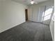 Inviting bedroom features neutral carpet and natural light from the window at 2887 Royal Blf, Decatur, GA 30030