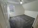Comfortable bedroom with neutral carpet, natural light, and a serene atmosphere at 2887 Royal Blf, Decatur, GA 30030