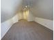 Spacious bonus room with carpet floors, neutral paint and ceiling fan at 2887 Royal Blf, Decatur, GA 30030