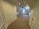Bright bonus room with neutral walls, dormer window and carpet floors at 2887 Royal Blf, Decatur, GA 30030