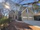 Charming home featuring a two-car garage, well-maintained landscaping, and a welcoming entrance at 2887 Royal Blf, Decatur, GA 30030