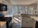 Updated kitchen with an open layout, gas range, and stone countertops at 2887 Royal Blf, Decatur, GA 30030