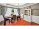 Traditional dining room featuring hardwood floors and stylish decor, with great natural light at 950 Besse Way, Locust Grove, GA 30248