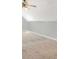 Attic Room with vaulted ceiling, carpet and a fan with built-in light at 950 Besse Way, Locust Grove, GA 30248