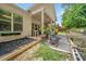 Backyard features a nice patio and garden beds at 1867 Willoughby Dr, Buford, GA 30519