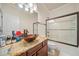 Bathroom with designer bowl sink and walk-in shower/tub at 1867 Willoughby Dr, Buford, GA 30519