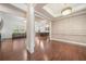 Spacious living area showcases hardwood floors and decorative trim work, perfect for entertaining guests at 1867 Willoughby Dr, Buford, GA 30519
