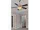 A stylish ceiling fan is featured in the bedroom with adjacent rooms visible through open doorways at 2122 Pembroke Dr, Brookhaven, GA 30319