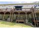 Multi-level decks offer outdoor living space and overlook the landscaped backyard at 2122 Pembroke Dr, Brookhaven, GA 30319