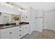 Modern bathroom features double vanity sinks, sleek fixtures, and ample cabinet space at 4720 Cooling Water Sw Cir, Powder Springs, GA 30127