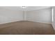 Spacious bedroom featuring neutral paint, plush carpeting, and ample natural light at 4720 Cooling Water Sw Cir, Powder Springs, GA 30127