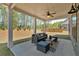 Inviting covered patio with comfortable outdoor seating, perfect for relaxing and entertaining at 4720 Cooling Water Sw Cir, Powder Springs, GA 30127