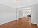 Open-concept living room showcases hardwood floors and seamless flow into the adjacent dining area at 4720 Cooling Water Sw Cir, Powder Springs, GA 30127