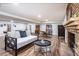 Finished basement with a fireplace, lounge area, and a pool table at 5925 Old Bill Cook Rd, South Fulton, GA 30349