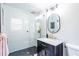 Beautiful bathroom featuring a glass shower, herringbone tile, and a stylish vanity with gold fixtures at 5925 Old Bill Cook Rd, South Fulton, GA 30349