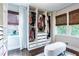 Bright closet with custom organizers featuring shelving, drawers, and natural light at 5925 Old Bill Cook Rd, South Fulton, GA 30349