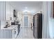 A kitchen with white cabinets, stainless steel appliances, and plenty of counter space at 5925 Old Bill Cook Rd, South Fulton, GA 30349