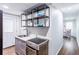 Cozy kitchenette featuring modern appliances, ample counter space, and sleek cabinetry at 5925 Old Bill Cook Rd, South Fulton, GA 30349