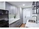 Cozy kitchenette featuring modern appliances, ample counter space, and sleek cabinetry at 5925 Old Bill Cook Rd, South Fulton, GA 30349
