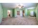 Oversized bedroom with ample room and adjoining bathroom and living spaces at 633 Iris Rd, Pine Lake, GA 30072