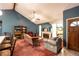 Open living room area with ample seating and fireplace at 633 Iris Rd, Pine Lake, GA 30072