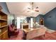 View of living room and fireplace with large seating area at 633 Iris Rd, Pine Lake, GA 30072